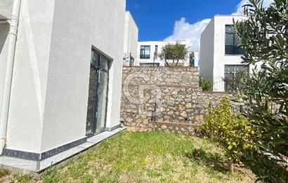 KIYIKIŞLACIK İASOS TA ATASAYANLAR PLAJLI SİTEDE 2 ADET 1+1 DAİRE