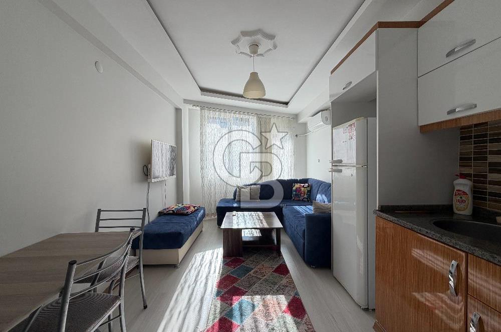 Buca DEÜ Yakını Cadde Üzeri Eşyalı Balkonlu 1+1 Daire