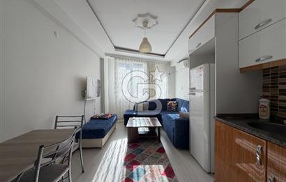 Buca DEÜ Yakını Cadde Üzeri Eşyalı Balkonlu 1+1 Daire