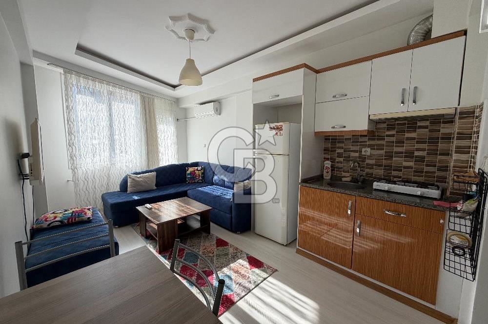 Buca DEÜ Yakını Cadde Üzeri Eşyalı Balkonlu 1+1 Daire