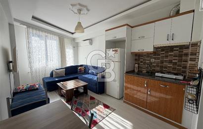 Buca DEÜ Yakını Cadde Üzeri Eşyalı Balkonlu 1+1 Daire