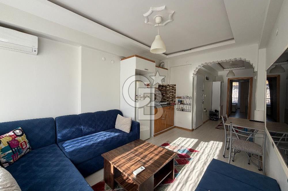 Buca DEÜ Yakını Cadde Üzeri Eşyalı Balkonlu 1+1 Daire
