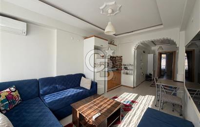 Buca DEÜ Yakını Cadde Üzeri Eşyalı Balkonlu 1+1 Daire