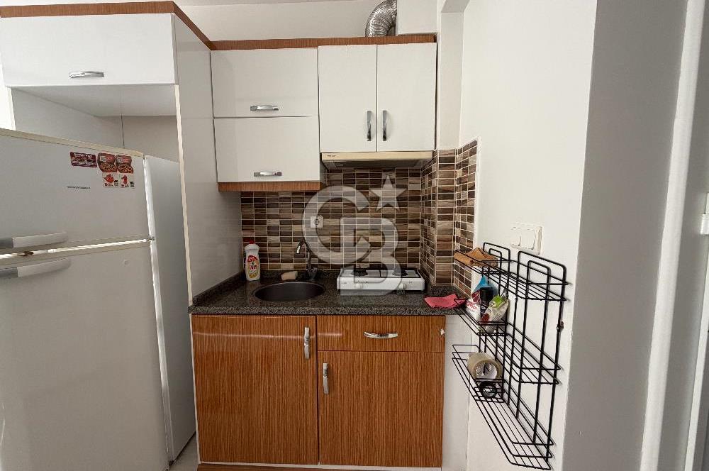 Buca DEÜ Yakını Cadde Üzeri Eşyalı Balkonlu 1+1 Daire