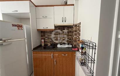 Buca DEÜ Yakını Cadde Üzeri Eşyalı Balkonlu 1+1 Daire