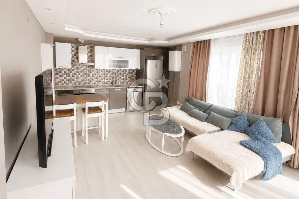 BAYRAKLI'DA DENİZ MANZARALI 65m2 EŞYALI SATILIK 1+1 YENİ DAİRE