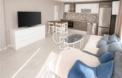 BAYRAKLI'DA DENİZ MANZARALI 65m2 EŞYALI SATILIK 1+1 YENİ DAİRE