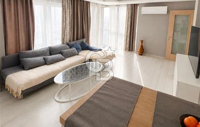 BAYRAKLI'DA DENİZ MANZARALI 65m2 EŞYALI SATILIK 1+1 YENİ DAİRE