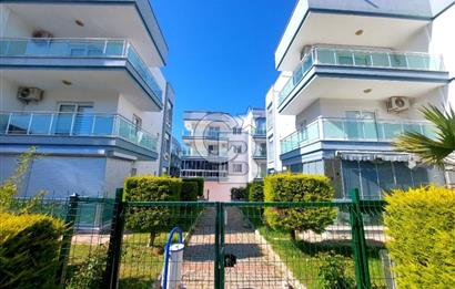 KUŞADASI DAVUTLAR SİTE İÇİ SATILIK GENİŞ 1+1 YAZLIK