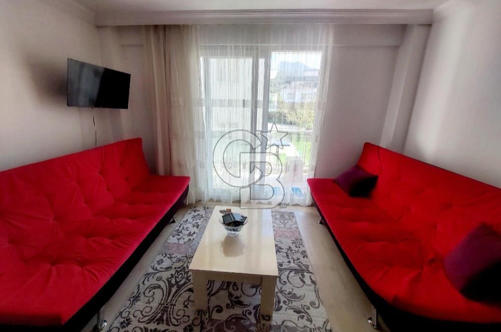 KUŞADASI DAVUTLAR SİTE İÇİ SATILIK GENİŞ 1+1 YAZLIK
