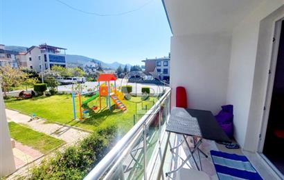 KUŞADASI DAVUTLAR SİTE İÇİ SATILIK GENİŞ 1+1 YAZLIK