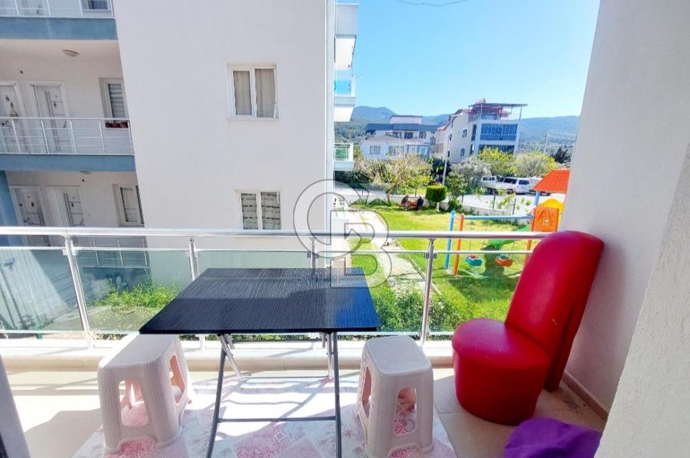 KUŞADASI DAVUTLAR SİTE İÇİ SATILIK GENİŞ 1+1 YAZLIK