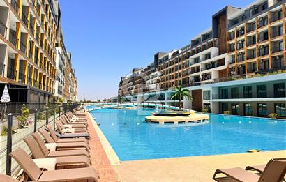 HAVUZLU SİTEDE FULL EŞYALI YÜKSEK KİRA GETİRİLİ 1+1 DAİRE