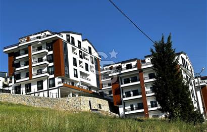 KOCAELİ BAŞİSKELE'DE 2+1 EĞİMSİZ SİTE İÇİNDE ÇATI DUBLEKSİ