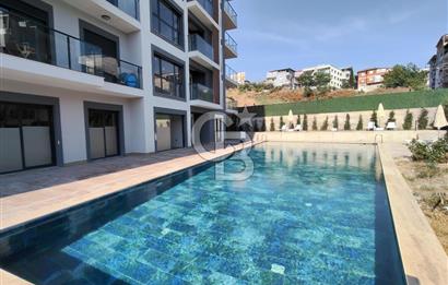 SİTE İÇİNDE KÖRFEZ MANZARALI 2+1 GENİŞ TERASLI SIFIR DAİRE