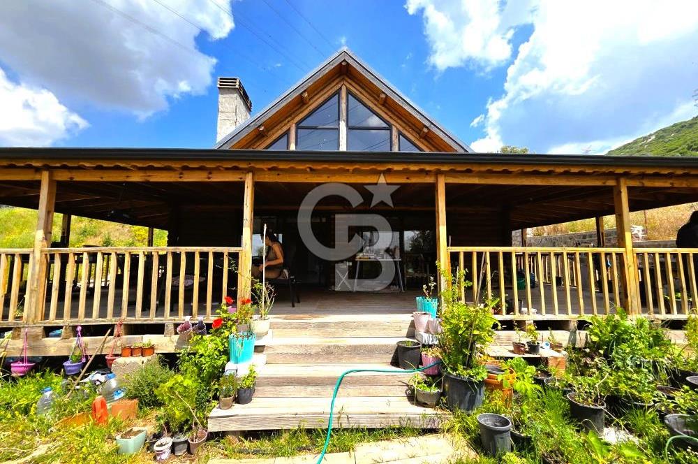 BORNOVA EĞRİDERE'DE 1000 M2 ARSA İÇİNDE AHŞAP BAĞ EVİ SATILIK