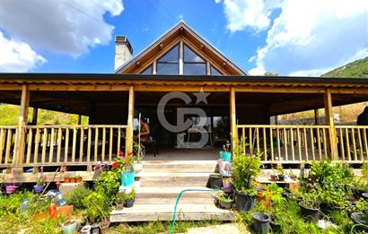 BORNOVA EĞRİDERE'DE 1000 M2 ARSA İÇİNDE AHŞAP BAĞ EVİ SATILIK