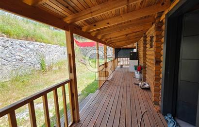 BORNOVA EĞRİDERE'DE 1000 M2 ARSA İÇİNDE AHŞAP BAĞ EVİ SATILIK