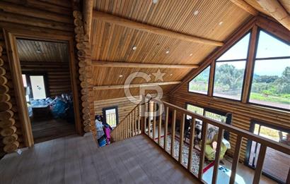 BORNOVA EĞRİDERE'DE 1000 M2 ARSA İÇİNDE AHŞAP BAĞ EVİ SATILIK