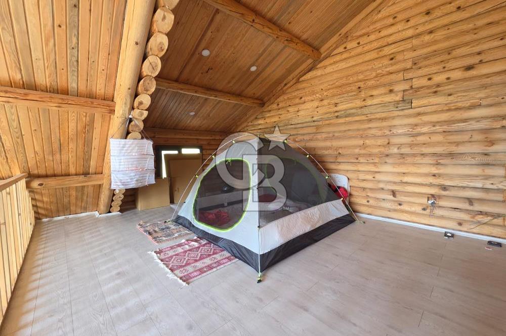 BORNOVA EĞRİDERE'DE 1000 M2 ARSA İÇİNDE AHŞAP BAĞ EVİ SATILIK
