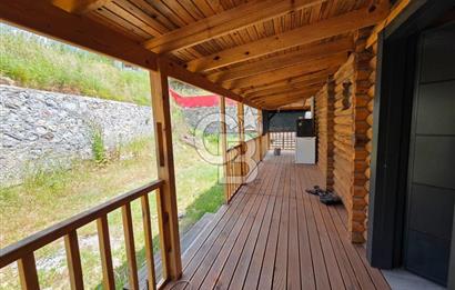 BORNOVA EĞRİDERE'DE 1000 M2 ARSA İÇİNDE AHŞAP BAĞ EVİ SATILIK