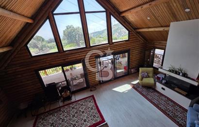BORNOVA EĞRİDERE'DE 1000 M2 ARSA İÇİNDE AHŞAP BAĞ EVİ SATILIK