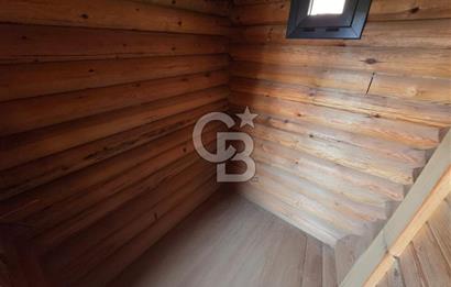BORNOVA EĞRİDERE'DE 1000 M2 ARSA İÇİNDE AHŞAP BAĞ EVİ SATILIK