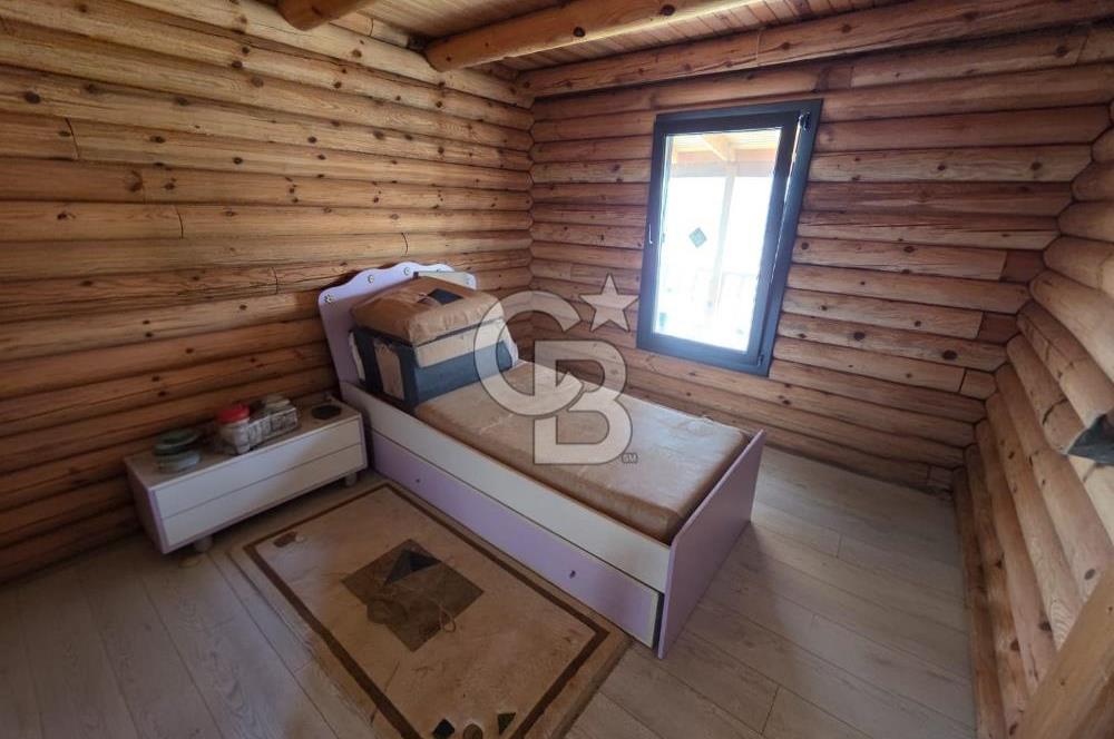 BORNOVA EĞRİDERE'DE 1000 M2 ARSA İÇİNDE AHŞAP BAĞ EVİ SATILIK