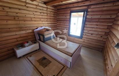 BORNOVA EĞRİDERE'DE 1000 M2 ARSA İÇİNDE AHŞAP BAĞ EVİ SATILIK