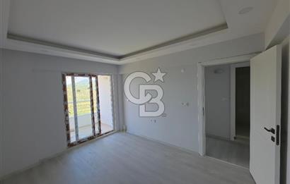 Kuşadası Değirmendere'de Deniz Manzaralı Satılık 2+1 Daire