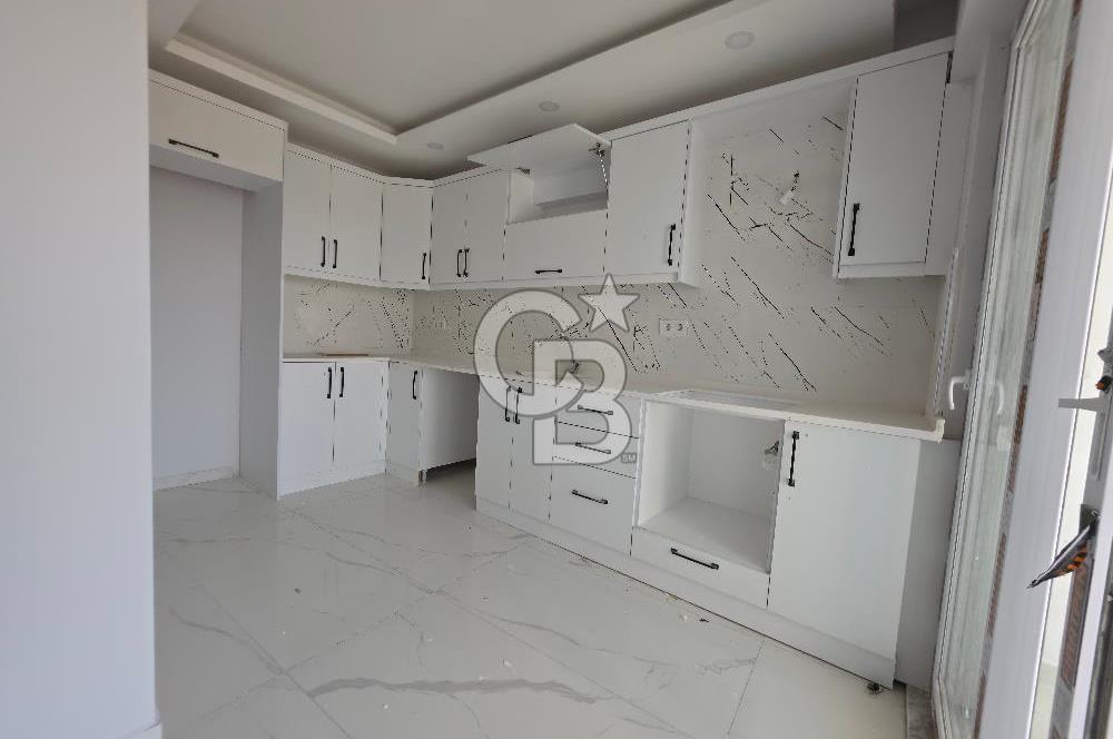 Kuşadası Değirmendere'de Deniz Manzaralı Satılık 2+1 Daire