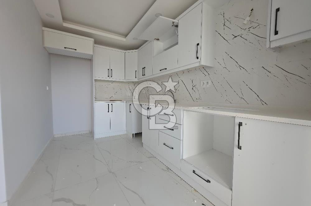 Kuşadası Değirmendere'de Deniz Manzaralı Satılık 2+1 Daire