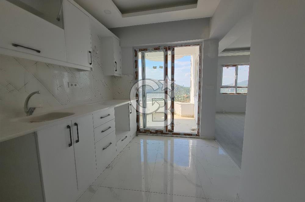 Kuşadası Değirmendere'de Deniz Manzaralı Satılık 2+1 Daire