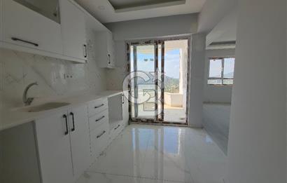 Kuşadası Değirmendere'de Deniz Manzaralı Satılık 2+1 Daire
