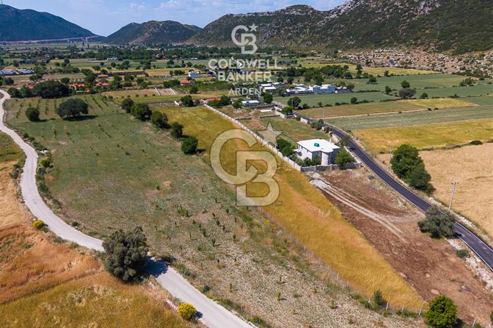 ANTALYA KAŞ BEZİRGAN DA CB ARDEN DEN 8082 m² SATILIK TARLA