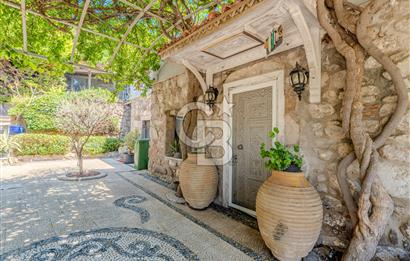 Bodrum Türkbükü’nde Eşyalı 1+1 Kış Bahçeli Müstakil Taş Ev