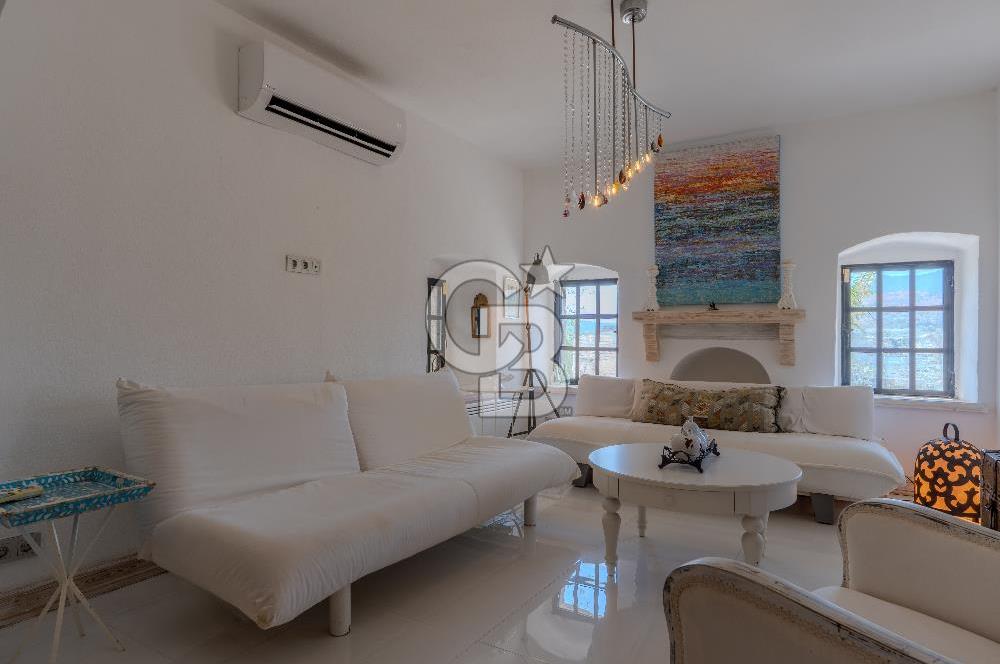 Bodrum Türkbükü’nde Eşyalı 1+1 Kış Bahçeli Müstakil Taş Ev