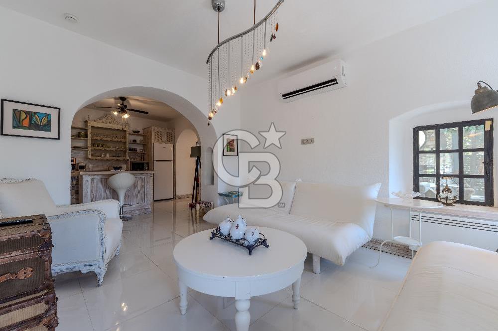 Bodrum Türkbükü’nde Eşyalı 1+1 Kış Bahçeli Müstakil Taş Ev