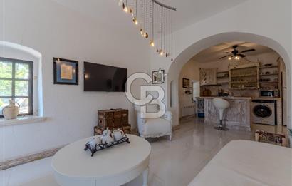 Bodrum Türkbükü’nde Eşyalı 1+1 Kış Bahçeli Müstakil Taş Ev