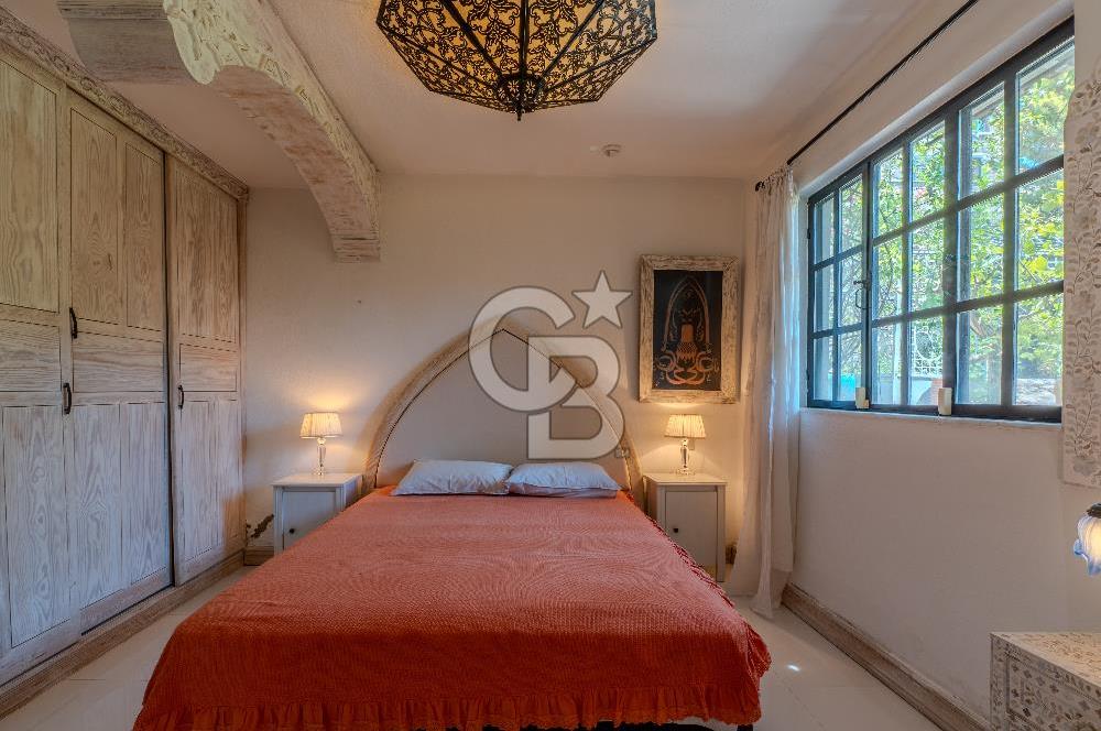 Bodrum Türkbükü’nde Eşyalı 1+1 Kış Bahçeli Müstakil Taş Ev