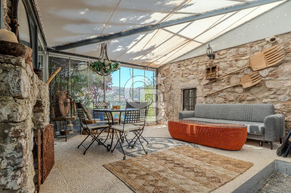 Bodrum Türkbükü’nde Eşyalı 1+1 Kış Bahçeli Müstakil Taş Ev