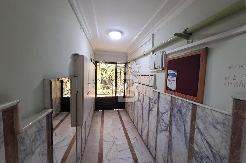 Bostanlı'da Satılık 3+1 Kombili Masrafsız Daire