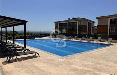 AYVALIK KÜÇÜKKÖY HAVUZLU SİTEDE SATILIK 2+1 GİRİŞ KAT DAİRE