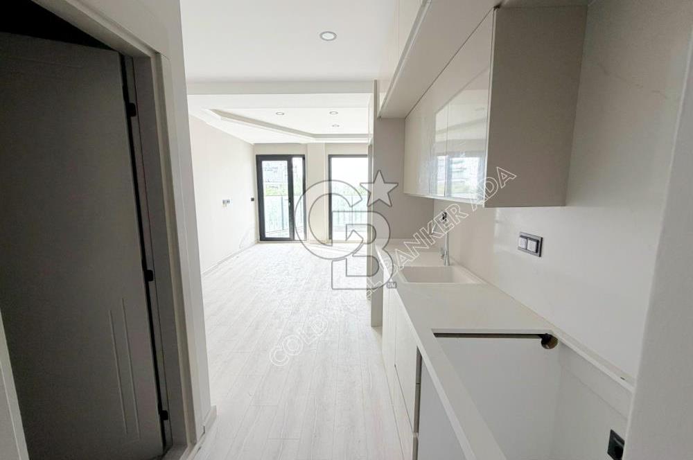 Güzelçamlı'da Denize Yürüme Mesafesinde Sıfır 1+1 Satılık Daire
