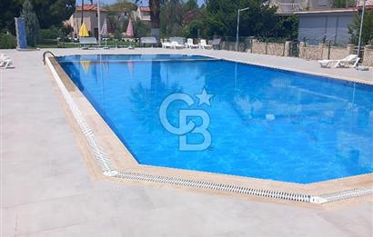 KUŞADASI DAVUTLARDA SİTE İÇERİSİNDE SATILIK TRİPLEKS VİLLA