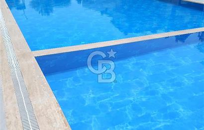 KUŞADASI DAVUTLARDA SİTE İÇERİSİNDE SATILIK TRİPLEKS VİLLA
