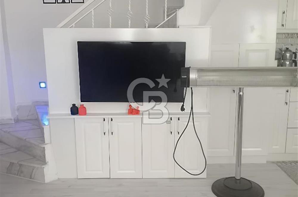 KUŞADASI DAVUTLARDA SİTE İÇERİSİNDE SATILIK TRİPLEKS VİLLA