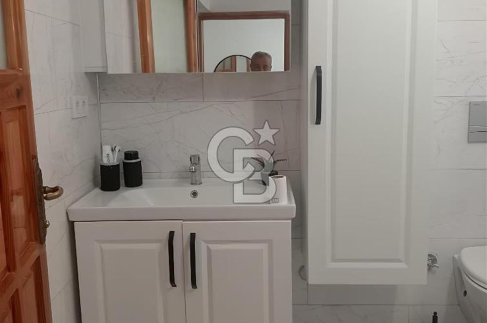 KUŞADASI DAVUTLARDA SİTE İÇERİSİNDE SATILIK TRİPLEKS VİLLA