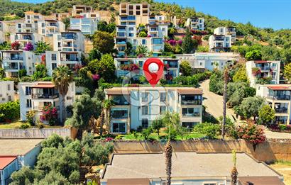 Bodrum Merkez'de Satılık Geniş Site İçi 2+1 Bahçe Katı Daire