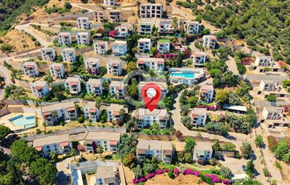Bodrum Merkez'de Satılık Geniş Site İçi 2+1 Bahçe Katı Daire